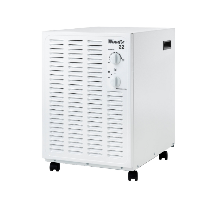 White portable air conditioner with control knobs on a white background