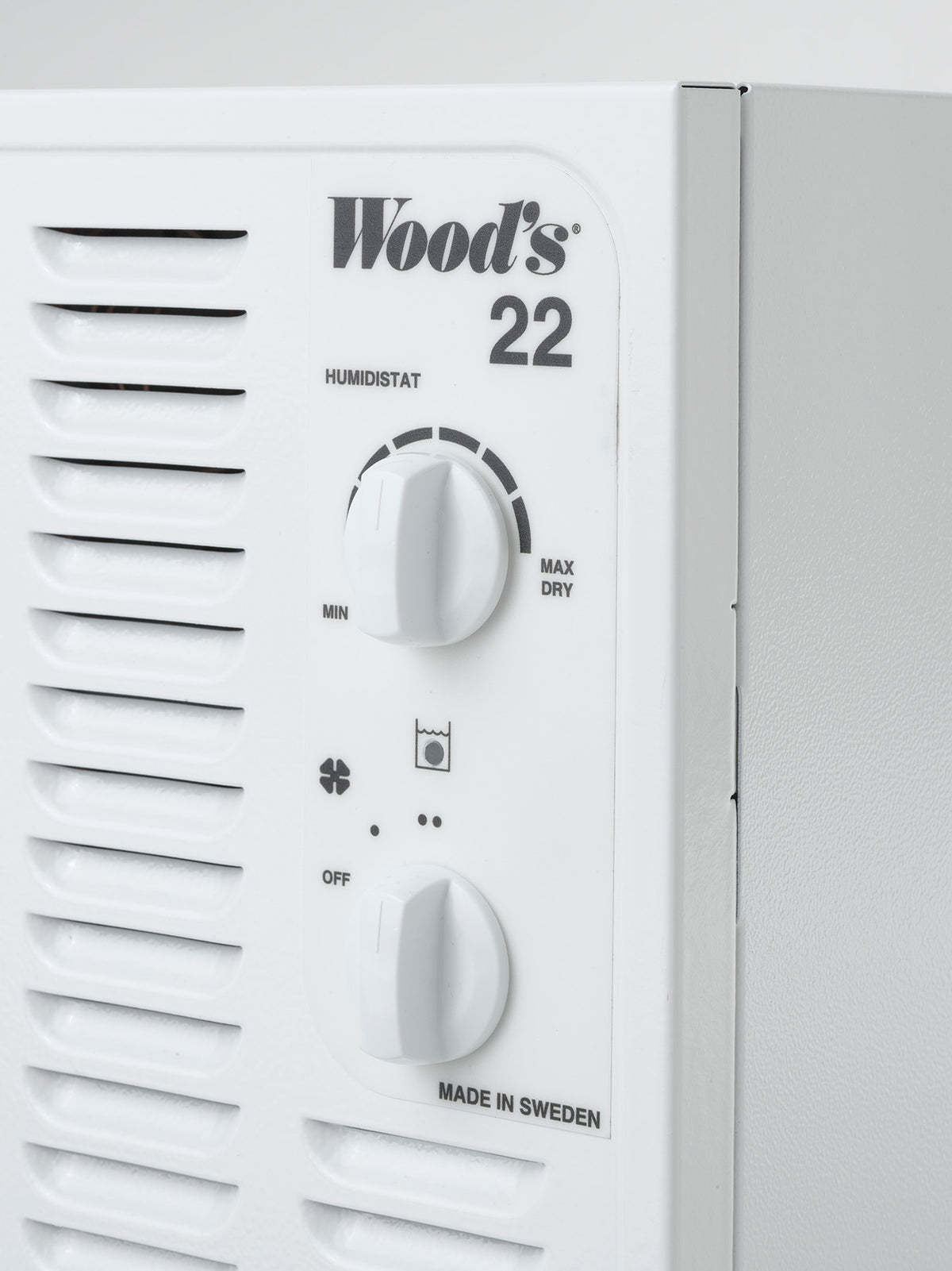 Wood's humidistat with control knobs on a white background