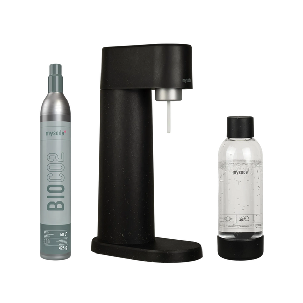 Black MySoda Woody soda maker displayed with a Bio CO2 cylinder and matching clear bottle