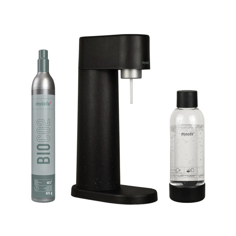 Black MySoda Woody soda maker displayed with a Bio CO2 cylinder and matching clear bottle