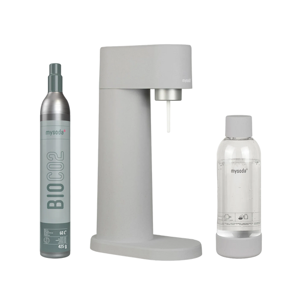 Grey MySoda Woody soda maker displayed with a Bio CO2 cylinder and matching clear bottle