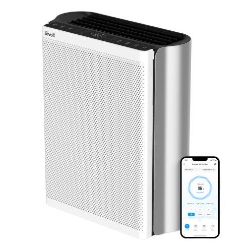 White and silver Levoit EverestAir smart air purifier beside a phone showing the control app